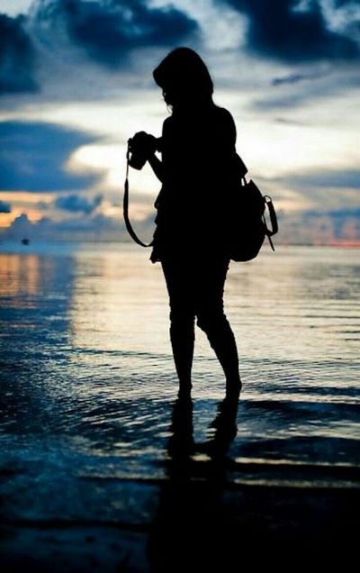 Девушка с фотоаппаратом