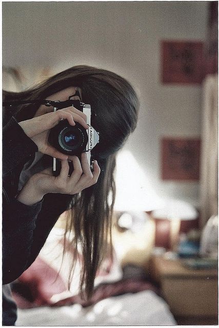 Девушка с фотоаппаратом