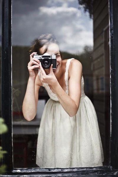 Девушка с фотоаппаратом