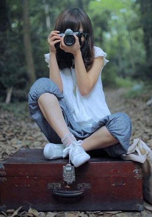 Девушка с фотоаппаратом